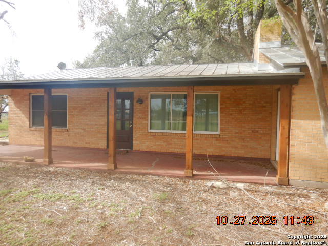 15397 Cassiano Road Elmendorf, TX 78112 - Photo 8 of 29 a backyard of a house