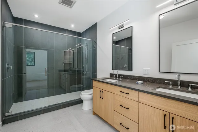 a kitchen with stainless steel appliances a sink stove and refrigerator