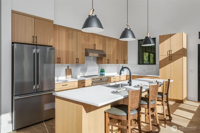 a view of backyard with outdoor seating and trees