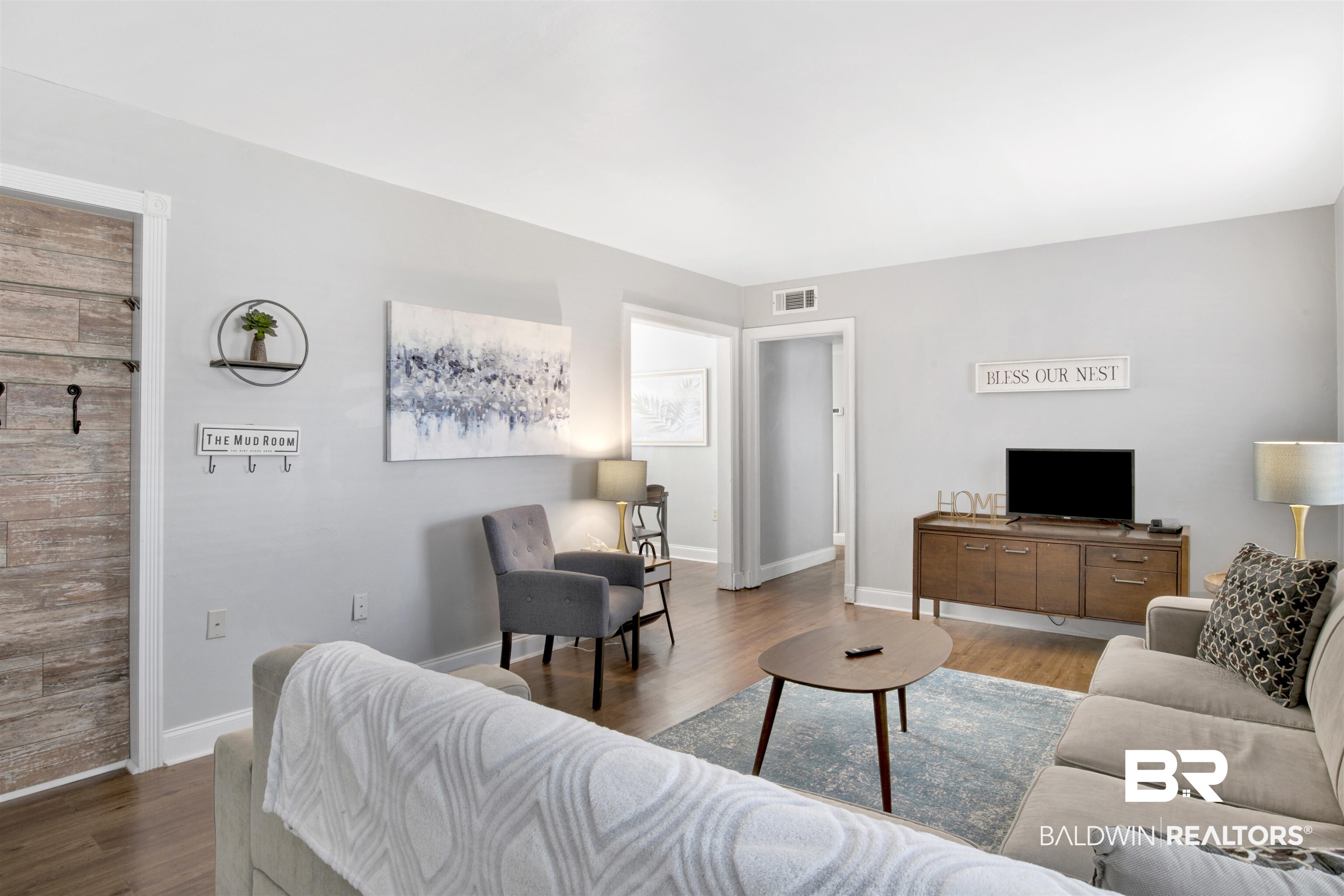 214 Upham Street, Unit 7A Mobile, AL 36607 - Photo 11 of 35 Living area with wood finished floors