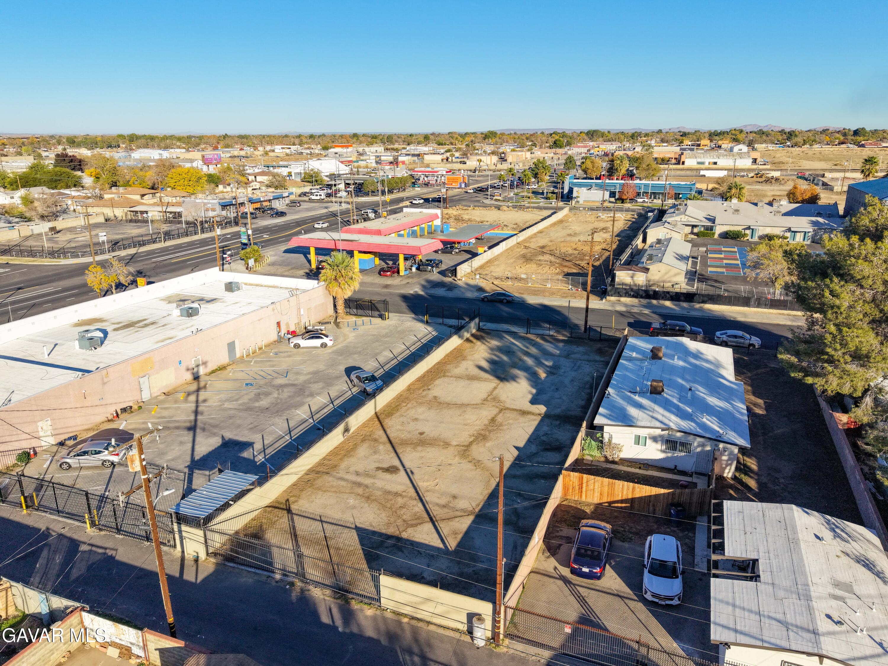 Cedar Avenue Vic Avenue, Unit J Lancaster, CA 93534 - Photo 10 of 14 an aerial view of residential houses with outdoor space