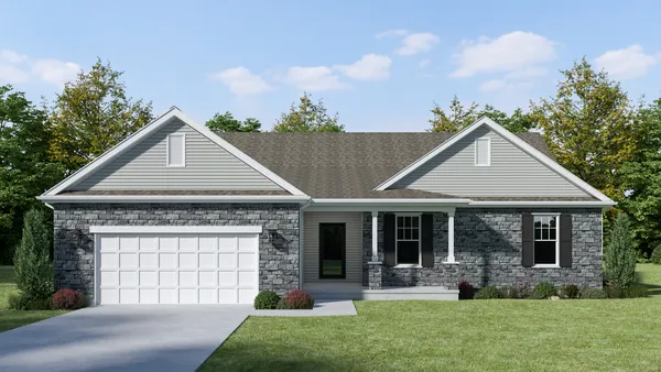 front view of a house with yard and trees