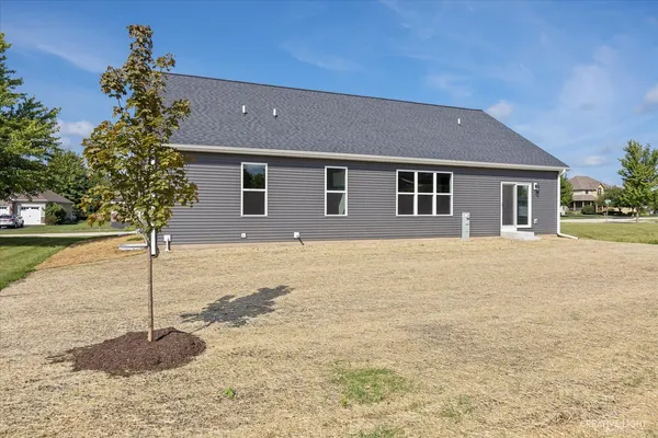 a house view with a outdoor space