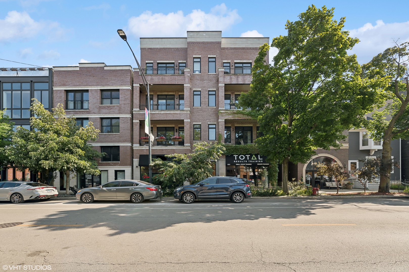 2207 West Roscoe Street, Unit 3E Chicago, IL 60618 - Photo 1 of 25 a front view of a building