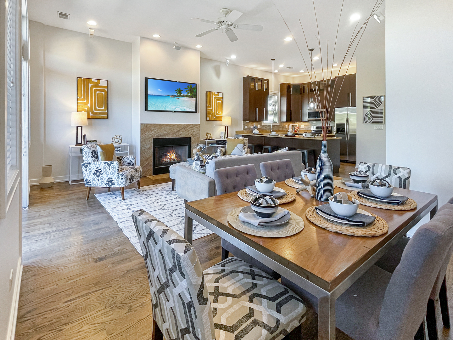 2207 West Roscoe Street, Unit 3E Chicago, IL 60618 - Photo 7 of 25 a view of a dining room with furniture and a fireplace