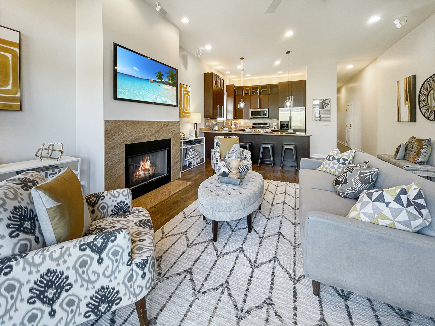 2207 West Roscoe Street, Unit 3E Chicago, IL 60618 - Photo 8 of 25 a living room with furniture and a fireplace