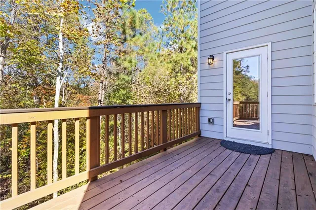 a view of porch with wooden floor