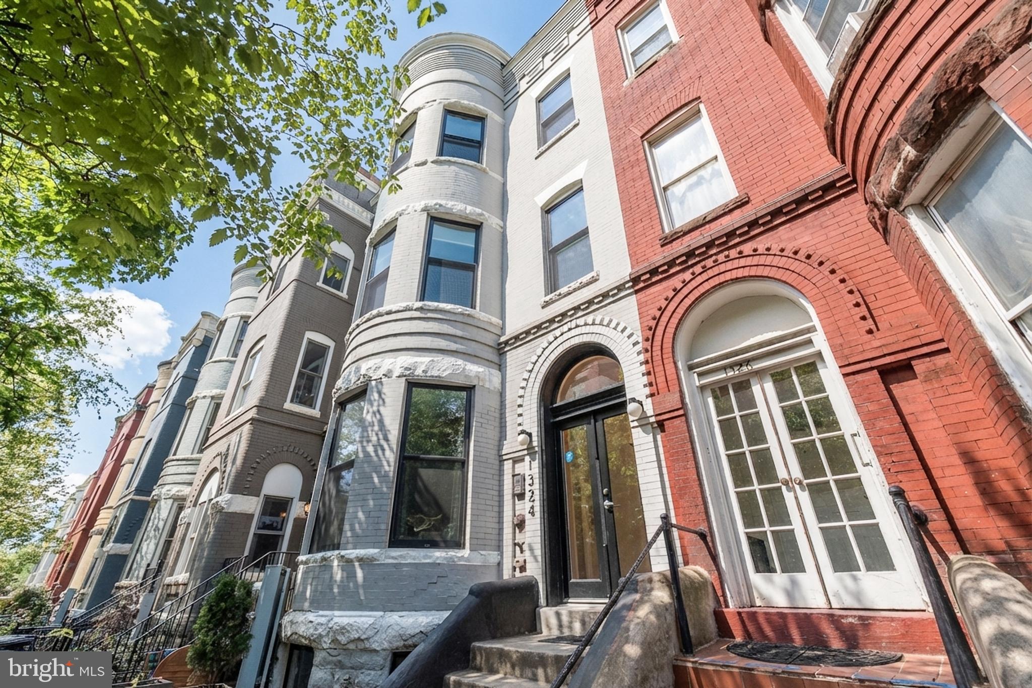 1324 W Street Northwest, Unit 1 Washington, DC 20009 - Photo 2 of 37 a front view of a multi story residential apartment building