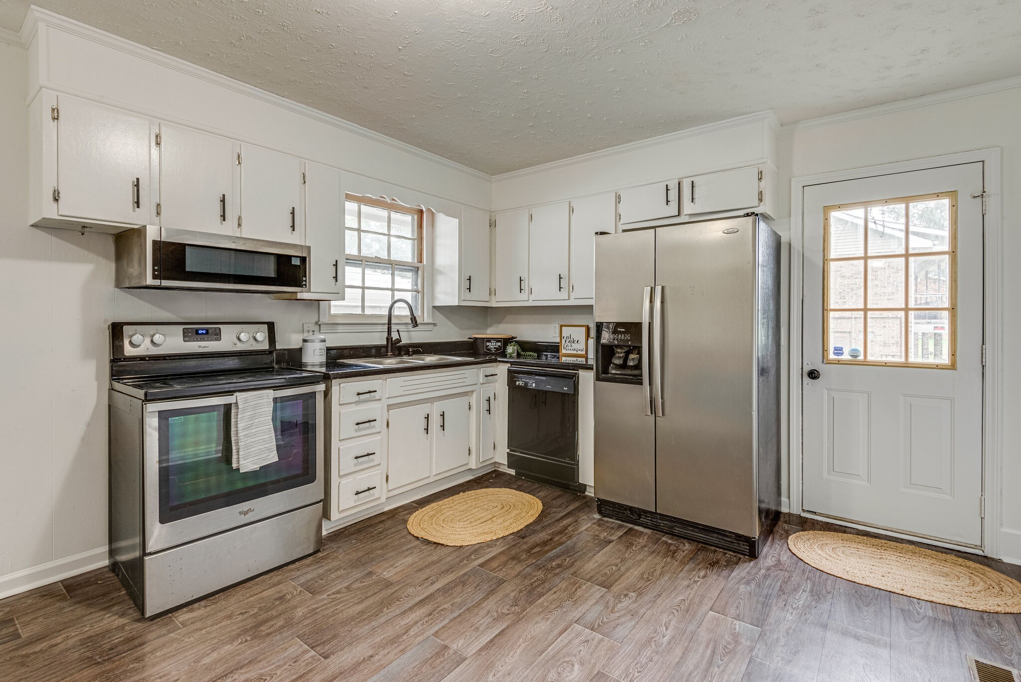 108 Chestnut Drive Dickson, TN 37055 - Photo 11 of 25 a kitchen with a refrigerator stove and microwave