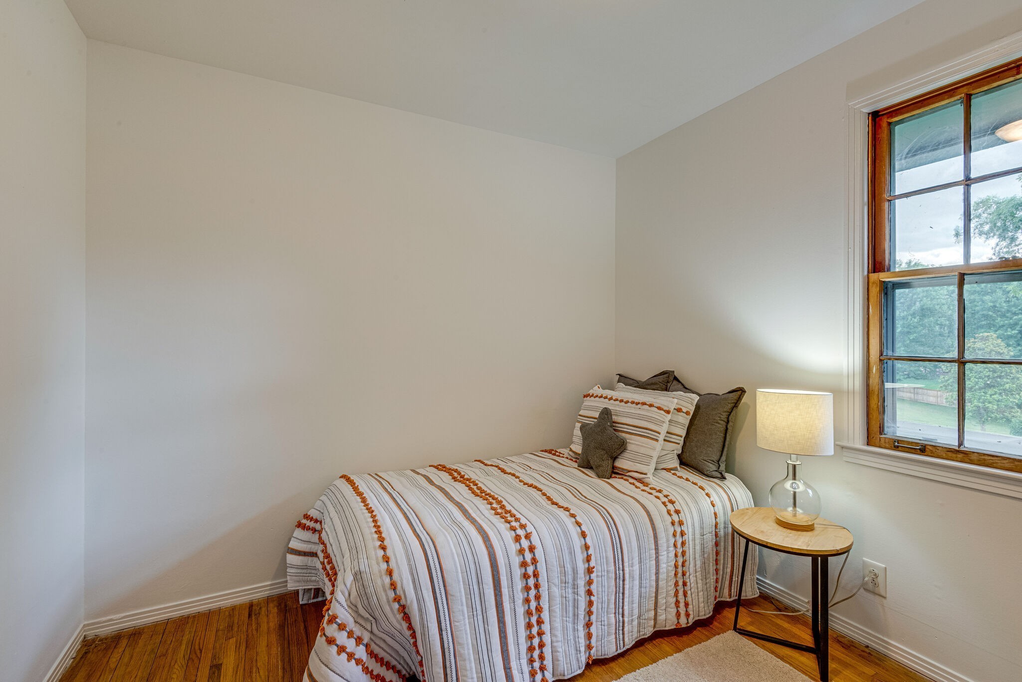 108 Chestnut Drive Dickson, TN 37055 - Photo 19 of 25 a bedroom with a bed and window