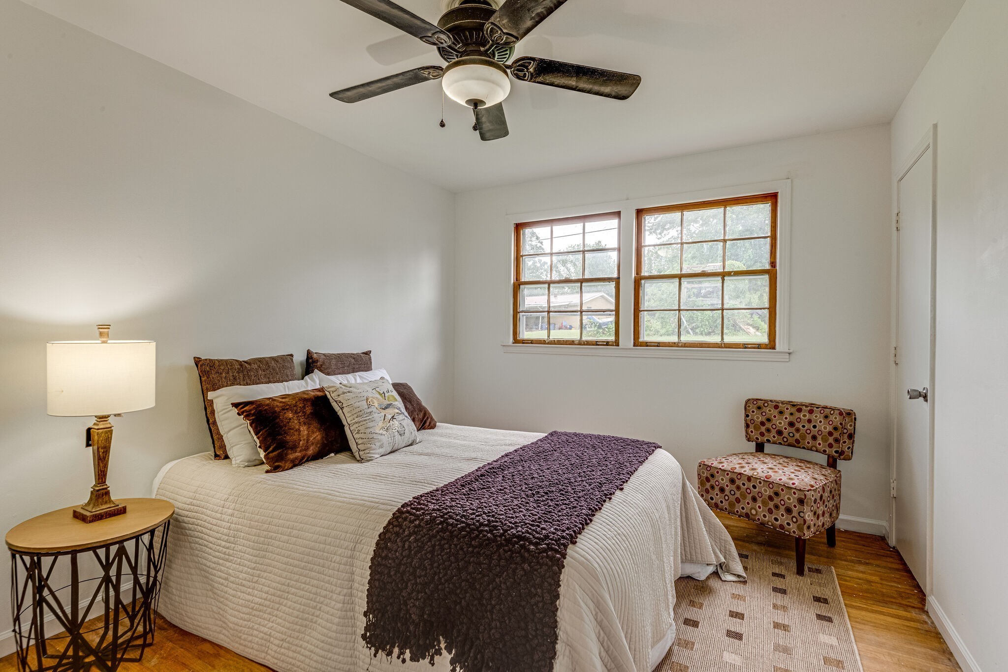 108 Chestnut Drive Dickson, TN 37055 - Photo 21 of 25 a bedroom with a bed and a chandelier