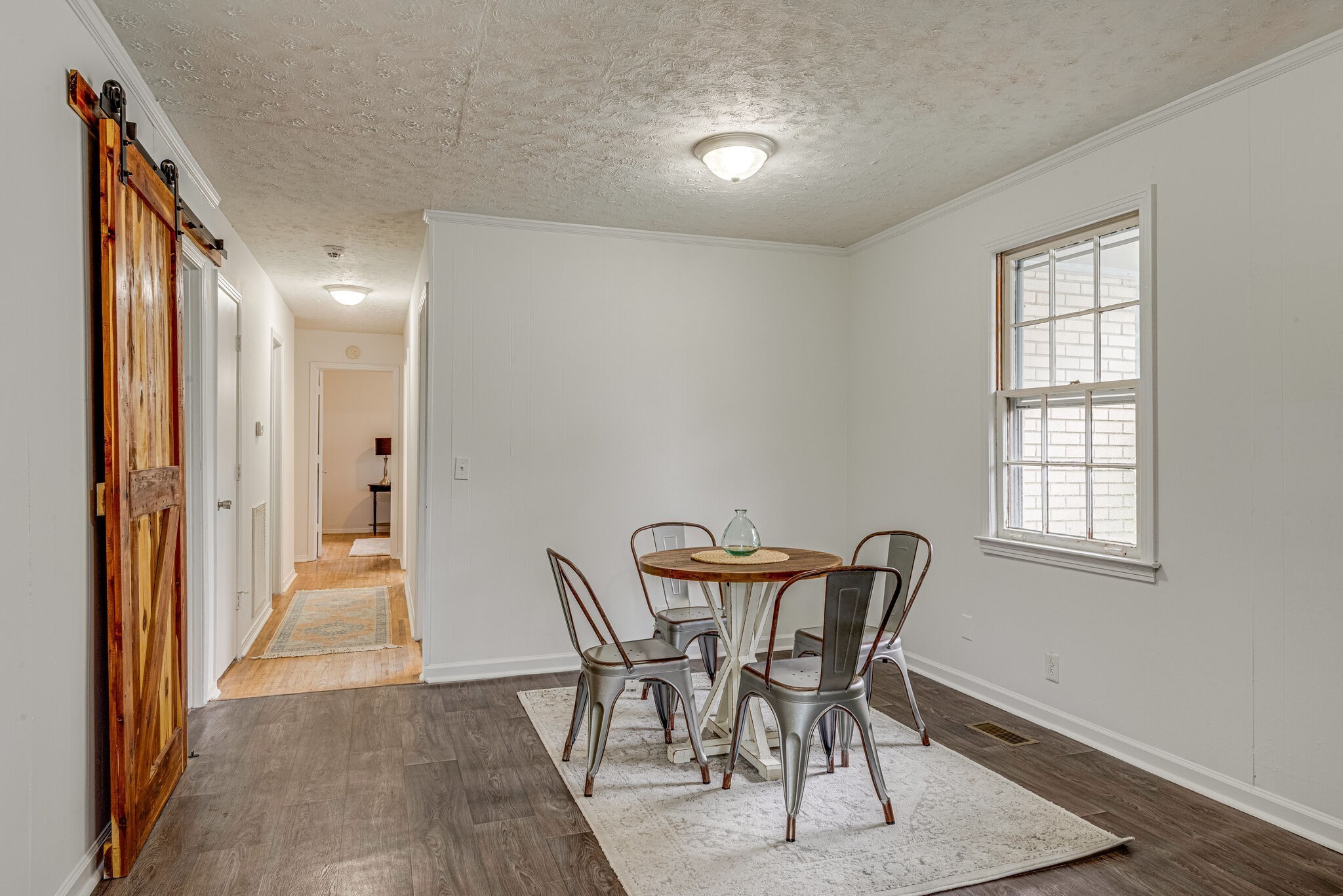 108 Chestnut Drive Dickson, TN 37055 - Photo 7 of 25 a view of a dining room with furniture and wooden floor