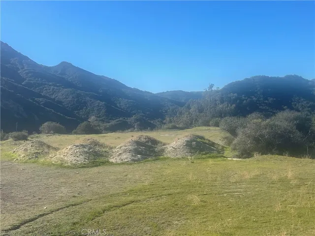 a view of a big room with mountain view