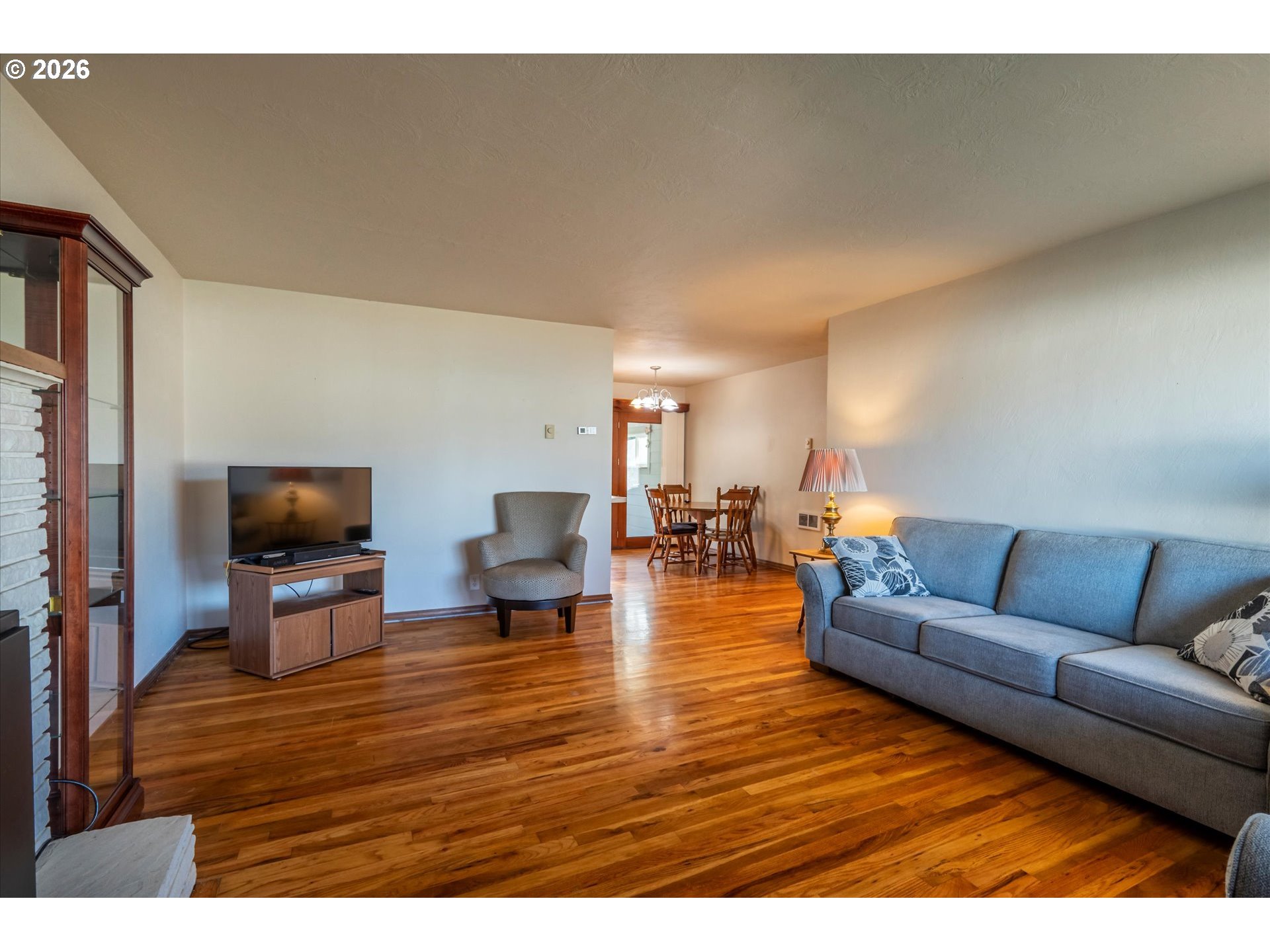 2480 Gardens Avenue Reedsport, OR 97467 - Photo 5 of 22 a living room with furniture and a flat screen tv