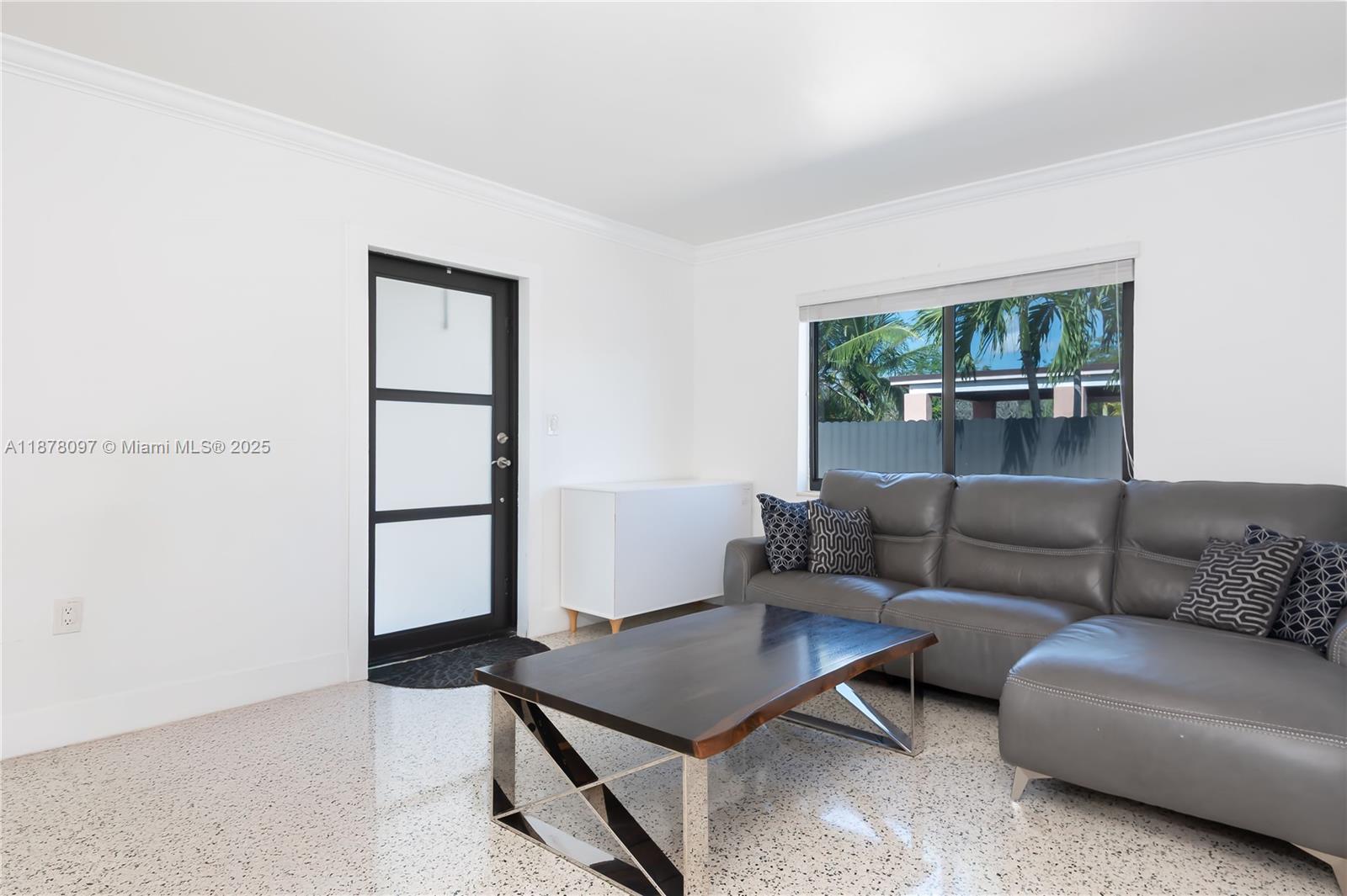 10370 Southwest 34th Street Miami, FL 33165 - Photo 17 of 47 a living room with furniture and a window