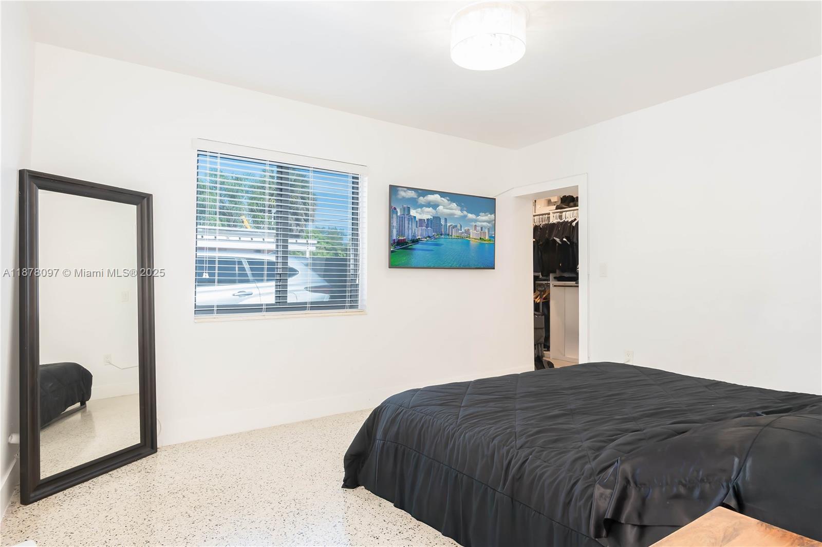 10370 Southwest 34th Street Miami, FL 33165 - Photo 22 of 47 a bedroom with a bed and a window