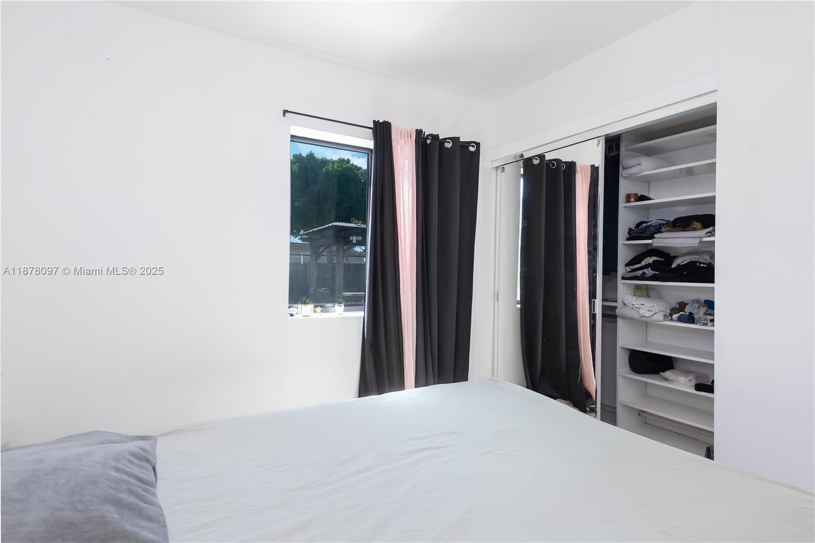 10370 Southwest 34th Street Miami, FL 33165 - Photo 32 of 47 a view of a bedroom with closet and bathroom
