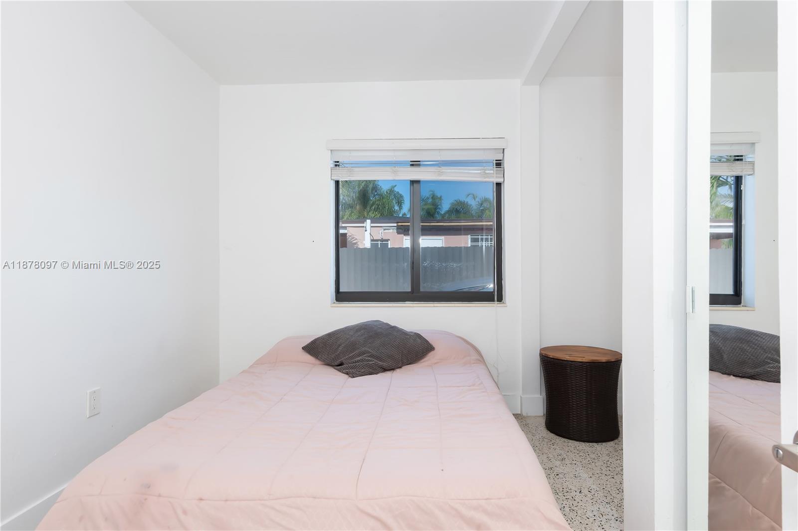 10370 Southwest 34th Street Miami, FL 33165 - Photo 33 of 47 a bedroom with a bed and a large window