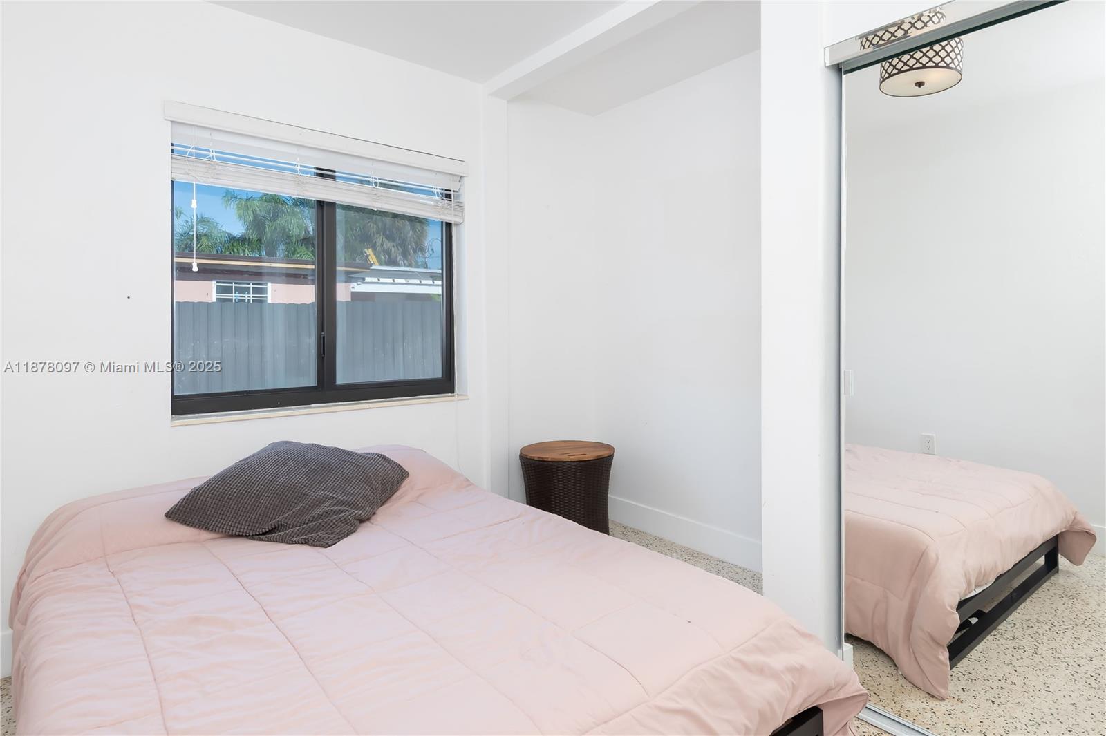 10370 Southwest 34th Street Miami, FL 33165 - Photo 34 of 47 a bedroom with a bed and a window