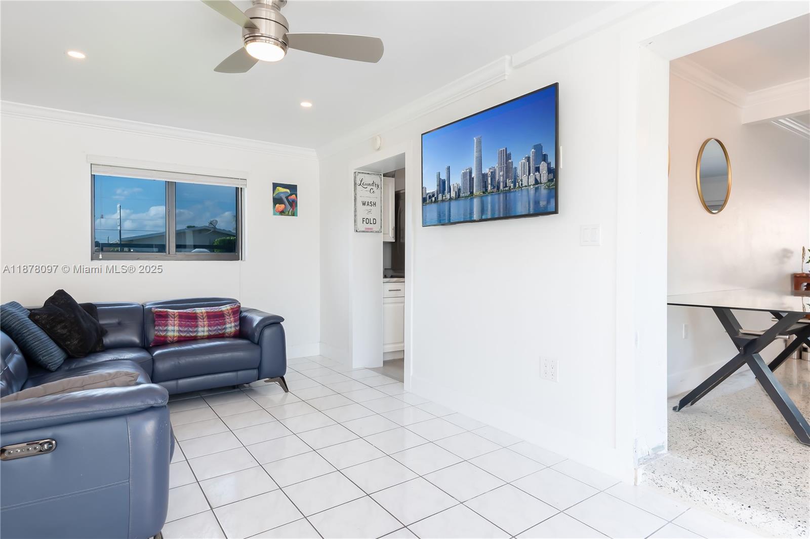 10370 Southwest 34th Street Miami, FL 33165 - Photo 35 of 47 a living room with furniture and a flat screen tv