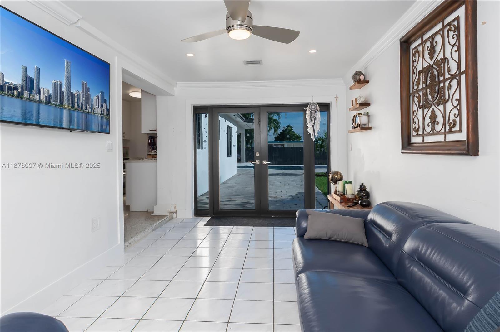 10370 Southwest 34th Street Miami, FL 33165 - Photo 37 of 47 a living room with furniture and large window