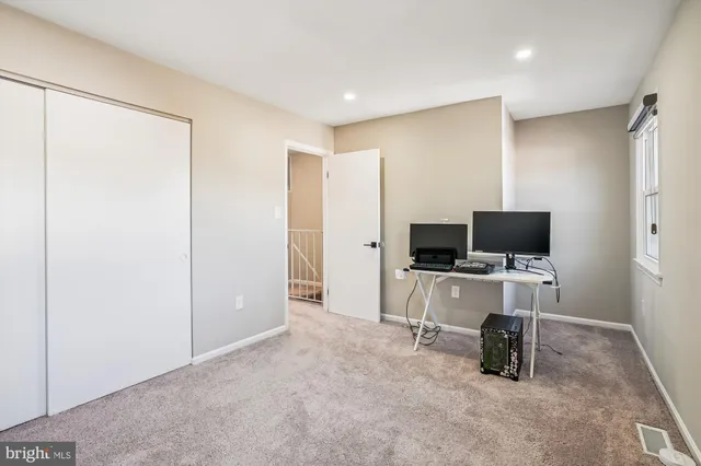 a view of a livingroom with a flat screen tv