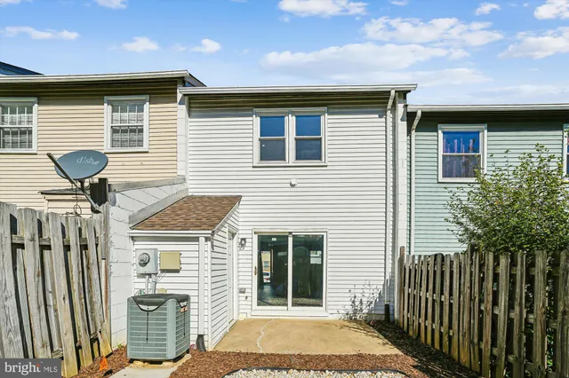 a front view of a house with a porch