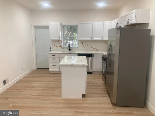 a room with a table and chairs