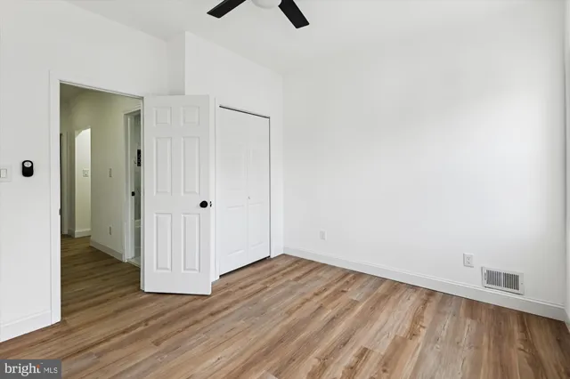 a bathroom with a sink toilet a shower and mirror