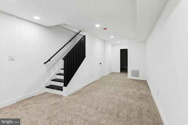 a view of a hallway with entryway