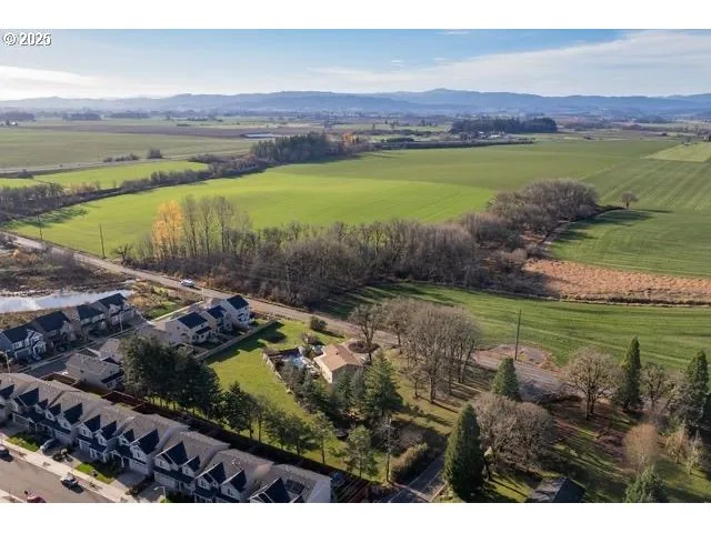 a view of a lake with a yard