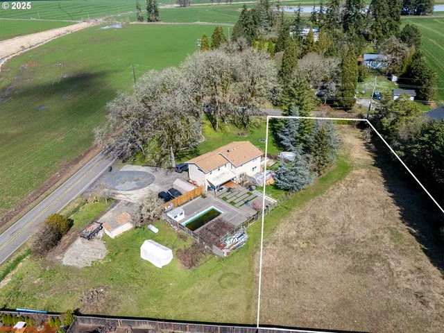 a view of yard with swimming pool