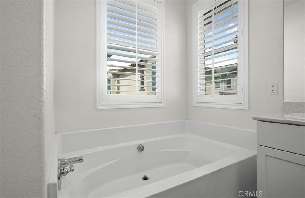 646 South Fillmore Avenue Rialto, CA 92376 - Photo 23 of 46 a white bath tub sitting next to a window