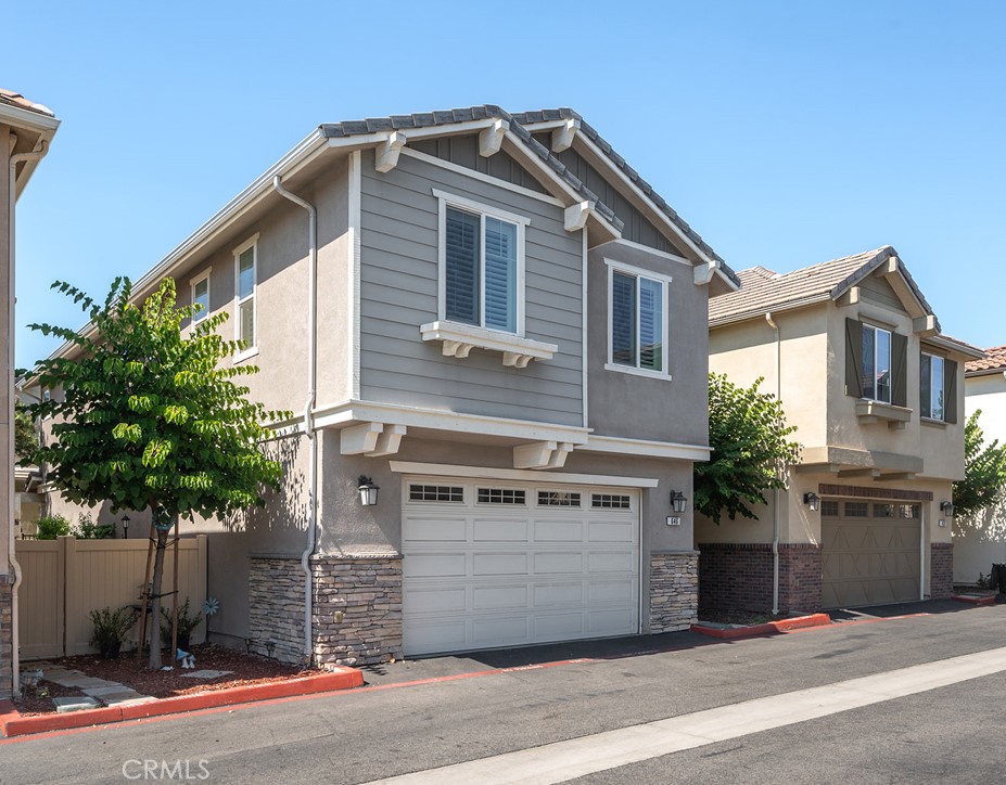 646 South Fillmore Avenue Rialto, CA 92376 - Photo 4 of 46 a front view of a house with a garden