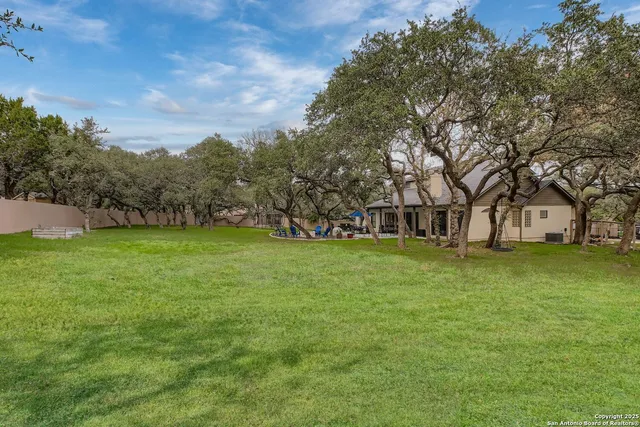 a view of a house with a big yard