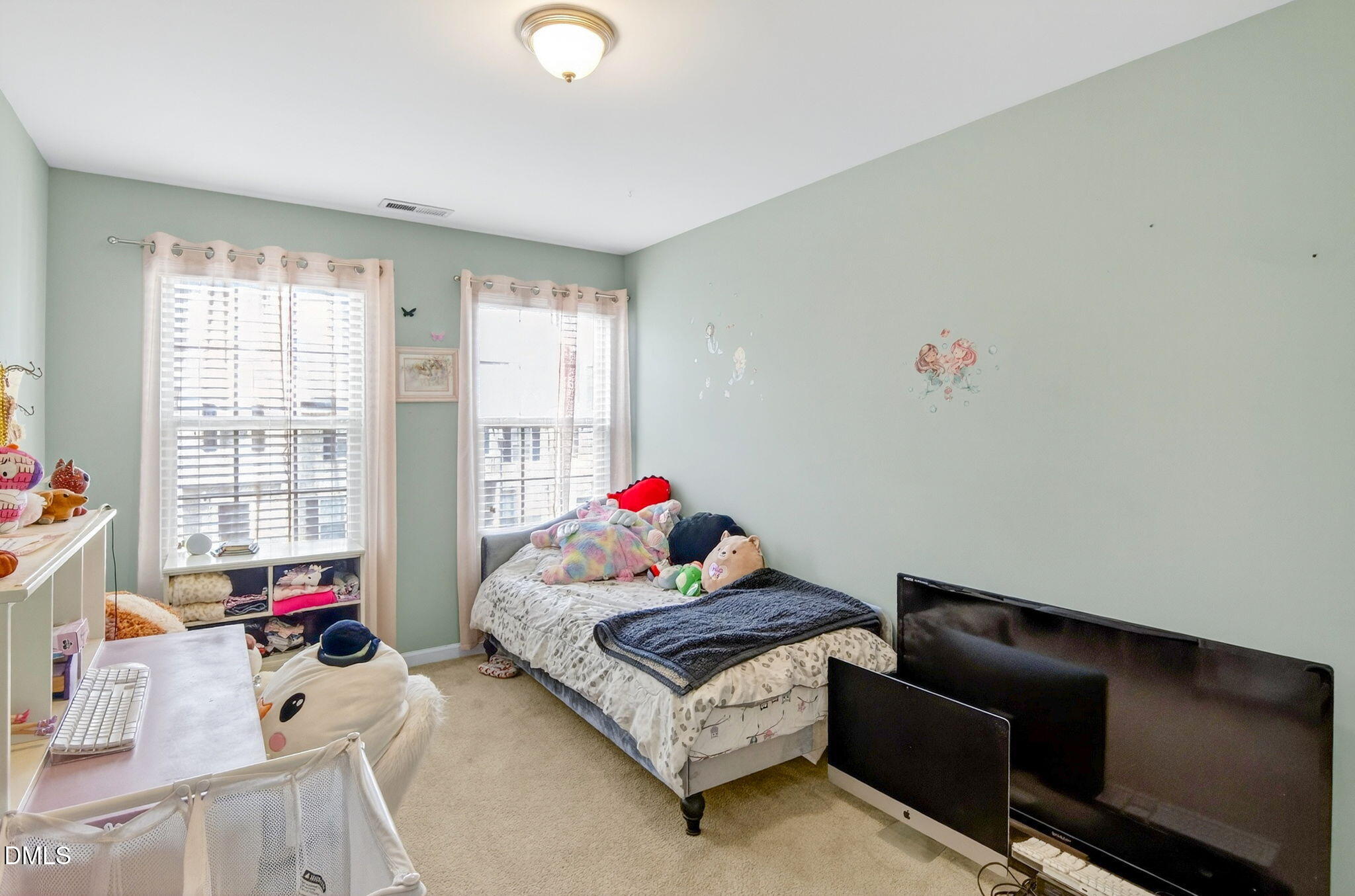 14310 Foxcroft Road Raleigh, NC 27614 - Photo 26 of 32 a living room with furniture and a window