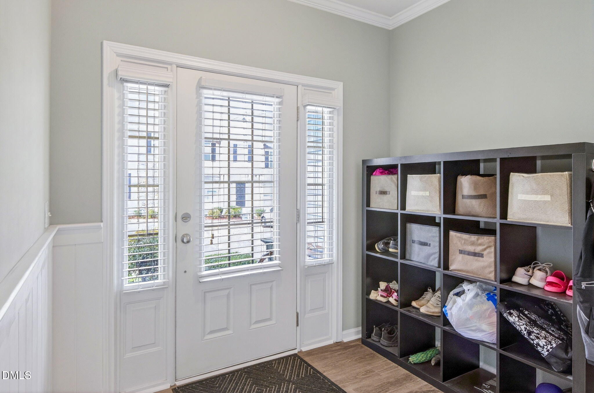 14310 Foxcroft Road Raleigh, NC 27614 - Photo 5 of 32 a bedroom with furniture and a book shelf