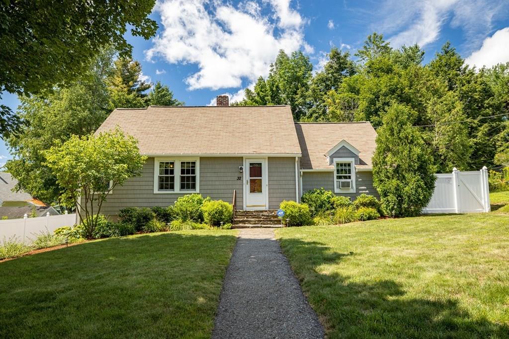 32 Maple Avenue Rutland, MA 01543 - Photo 1 of 42 a front view of a house with garden