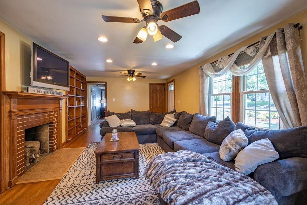 32 Maple Avenue Rutland, MA 01543 - Photo 15 of 42 a living room with furniture fireplace and a flat screen tv