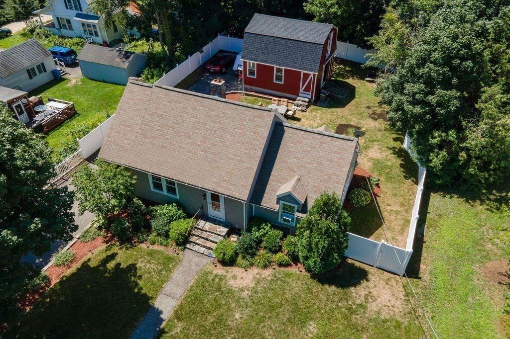 32 Maple Avenue Rutland, MA 01543 - Photo 3 of 42 an aerial view of a house with swimming pool and garden