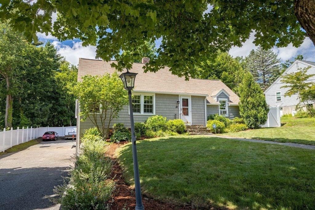 32 Maple Avenue Rutland, MA 01543 - Photo 4 of 42 a front view of a house with garden