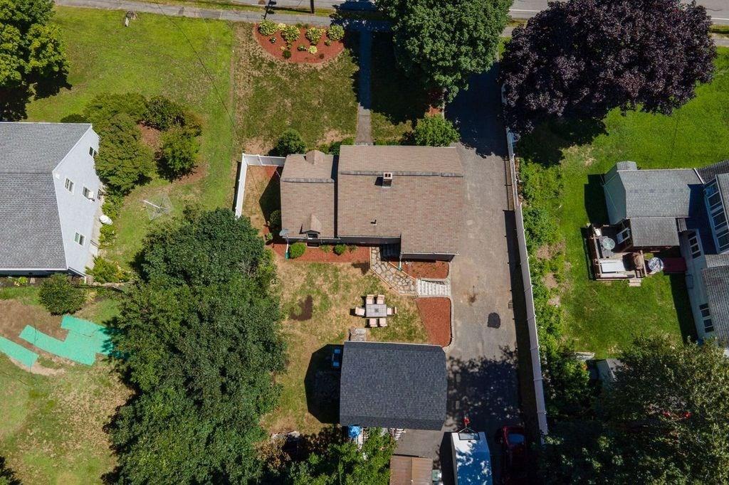 32 Maple Avenue Rutland, MA 01543 - Photo 42 of 42 an aerial view of residential house with outdoor space and trees all around
