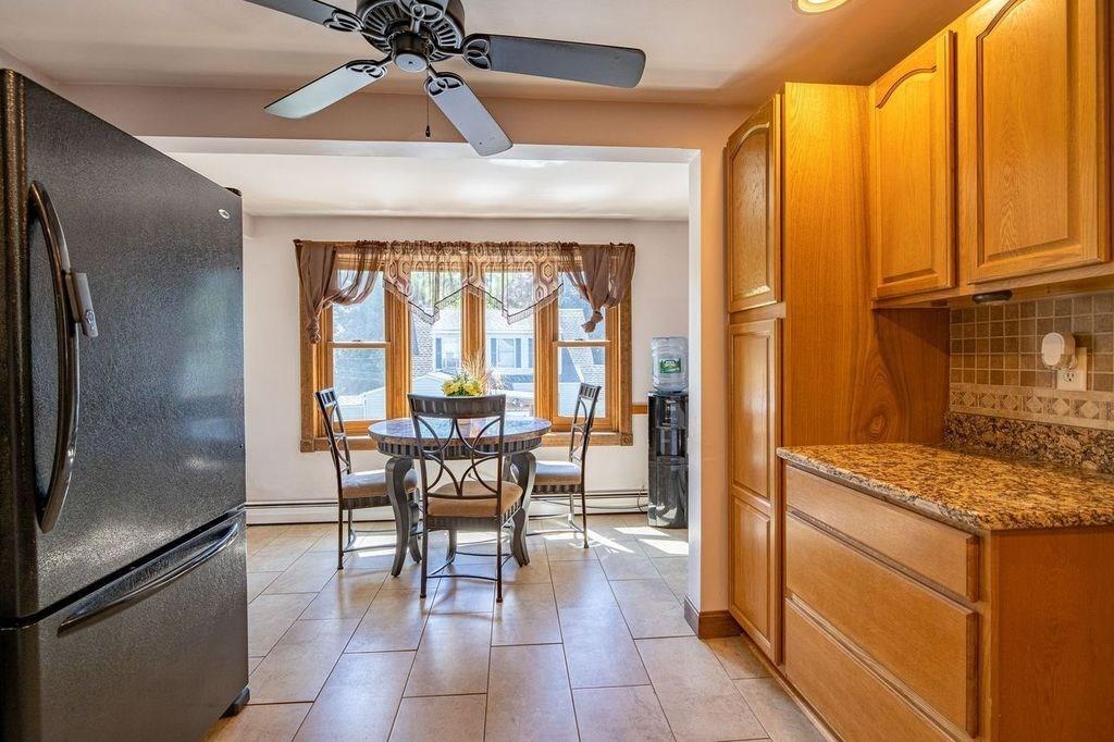 32 Maple Avenue Rutland, MA 01543 - Photo 7 of 42 a view of a dining room with furniture window and outside view