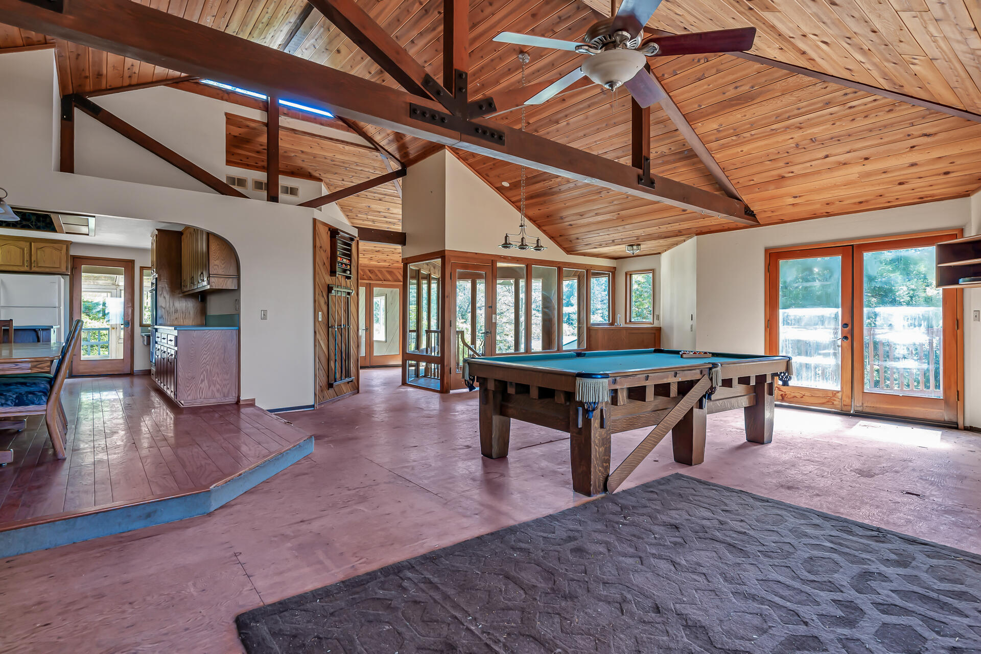 15368 Star Flower Road Oak Run, CA 96069 - Photo 28 of 63 a view of a dining room with wooden floor and furniture