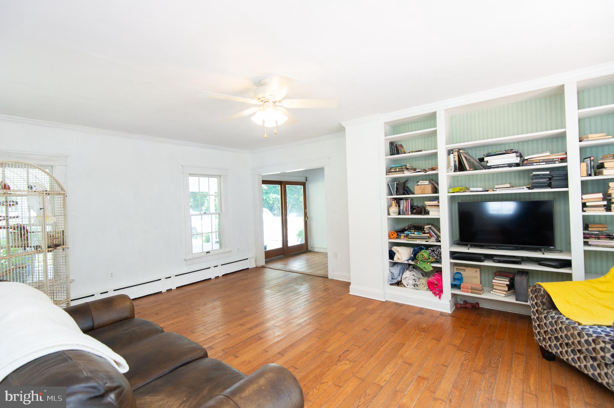 23130 Sparks Road Ridgely, MD 21660 - Photo 8 of 74 a living room with furniture and a flat screen tv