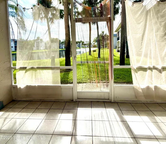 a bathroom with a bathtub and window