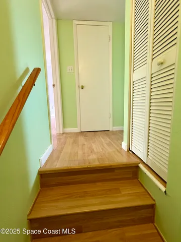 a room with a bed and a window