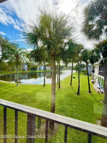 a view of swimming pool and a garden