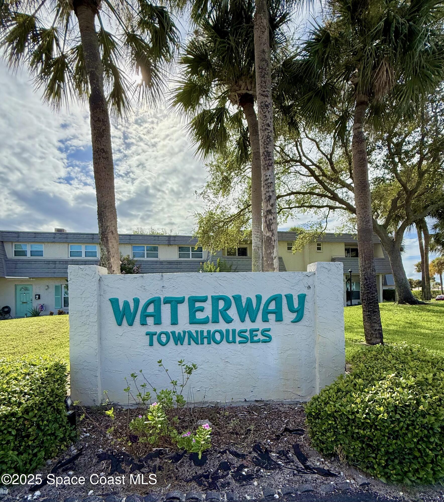 417 Ibis Lane, Unit 96 Satellite Beach, FL 32937 - Photo 29 of 29 a sign that is on the side of the road