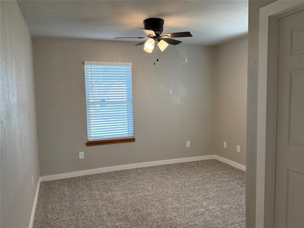 10109 Clark Airfield Road Justin, TX 76247 - Photo 15 of 24 This is the largest of the bedrooms. It has a walk-in closet.